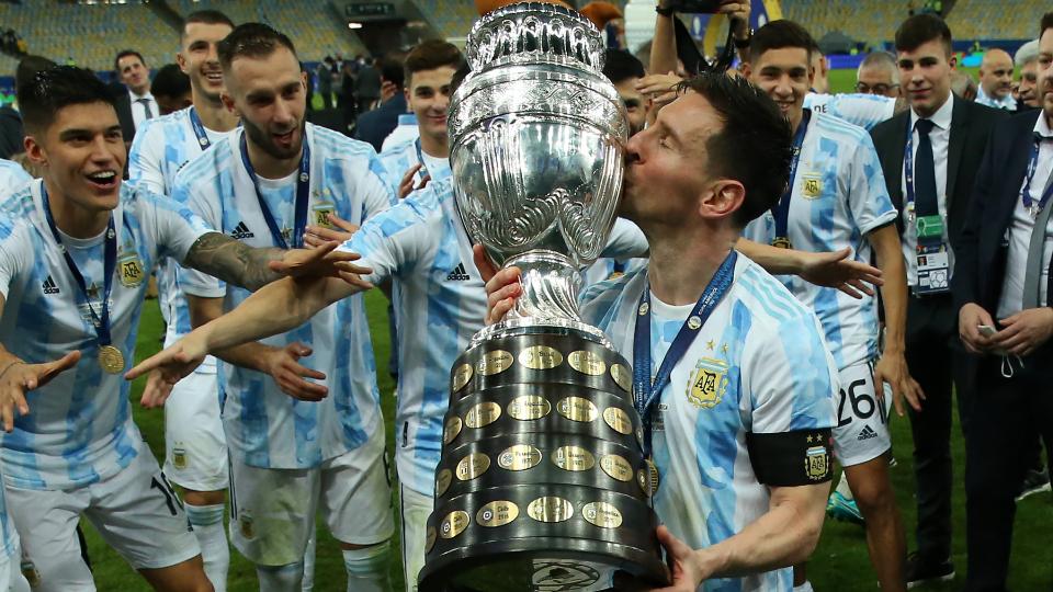 Lionel Messi after wining the Copa America with Argentina while kissing the trophy