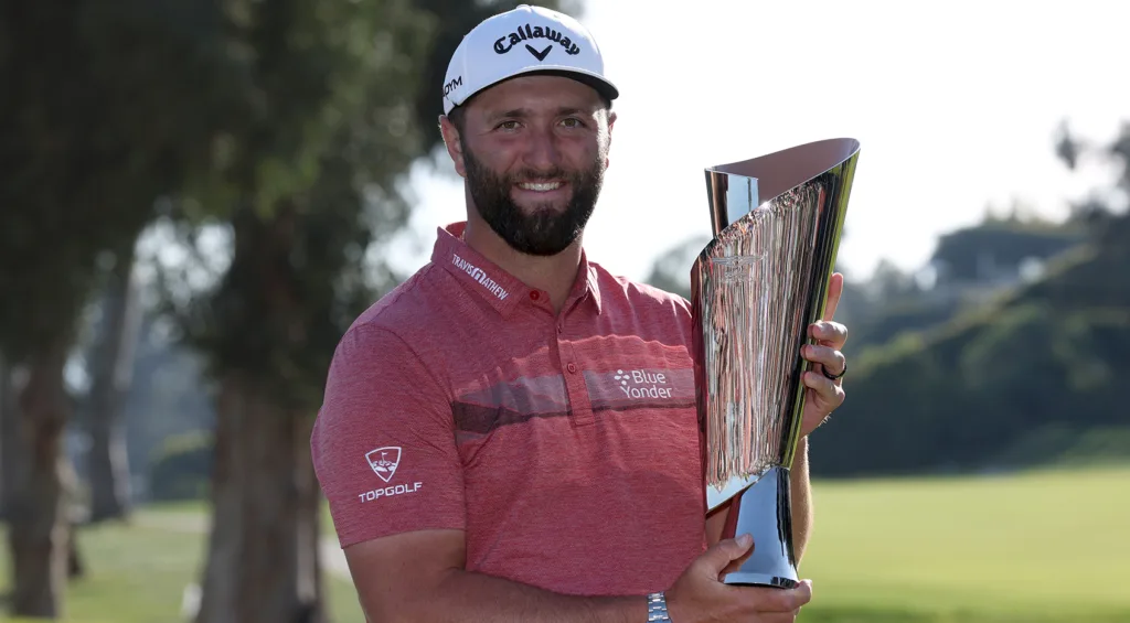 Jon Rahm with his trophy after wining the genesis Invitational