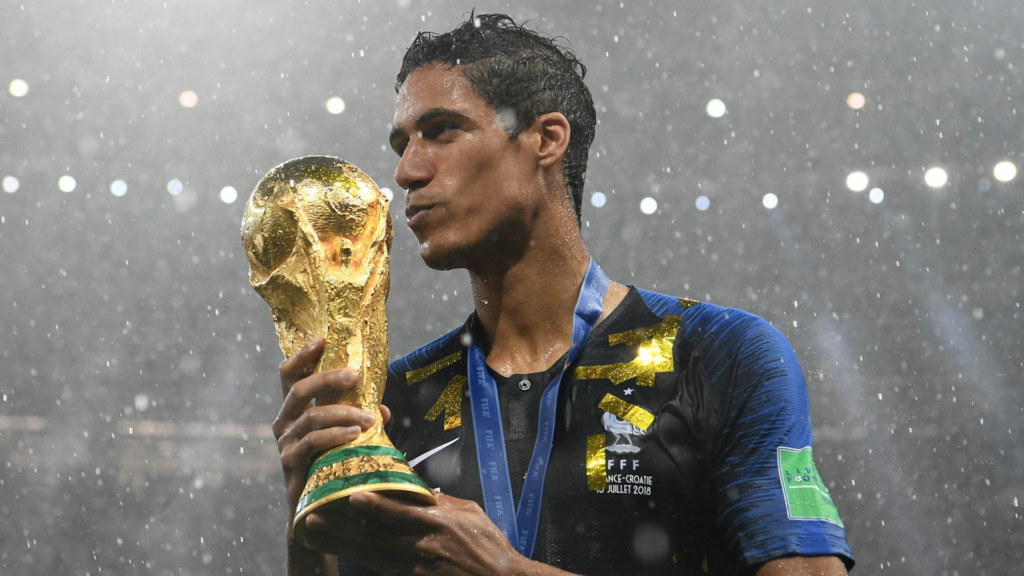 Raphael Varane with the world cup trophy on his hands 