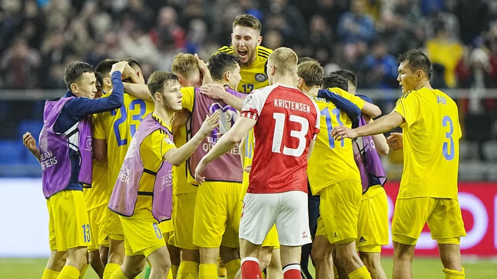 Kazakhstan players celebrating after winning 3-2 against Denmark in the Euro 2024 qualifying