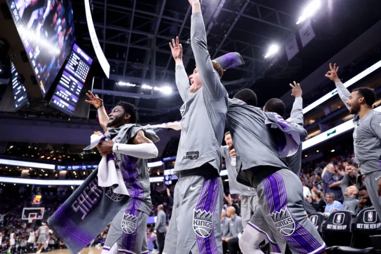 Kings celebrating after getting their pass to the NBA playoff for the first time in 16 years