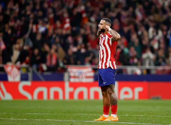 Memphis Depay celebrating a goal in Atletico Madrid victory against Sevilla 6-1