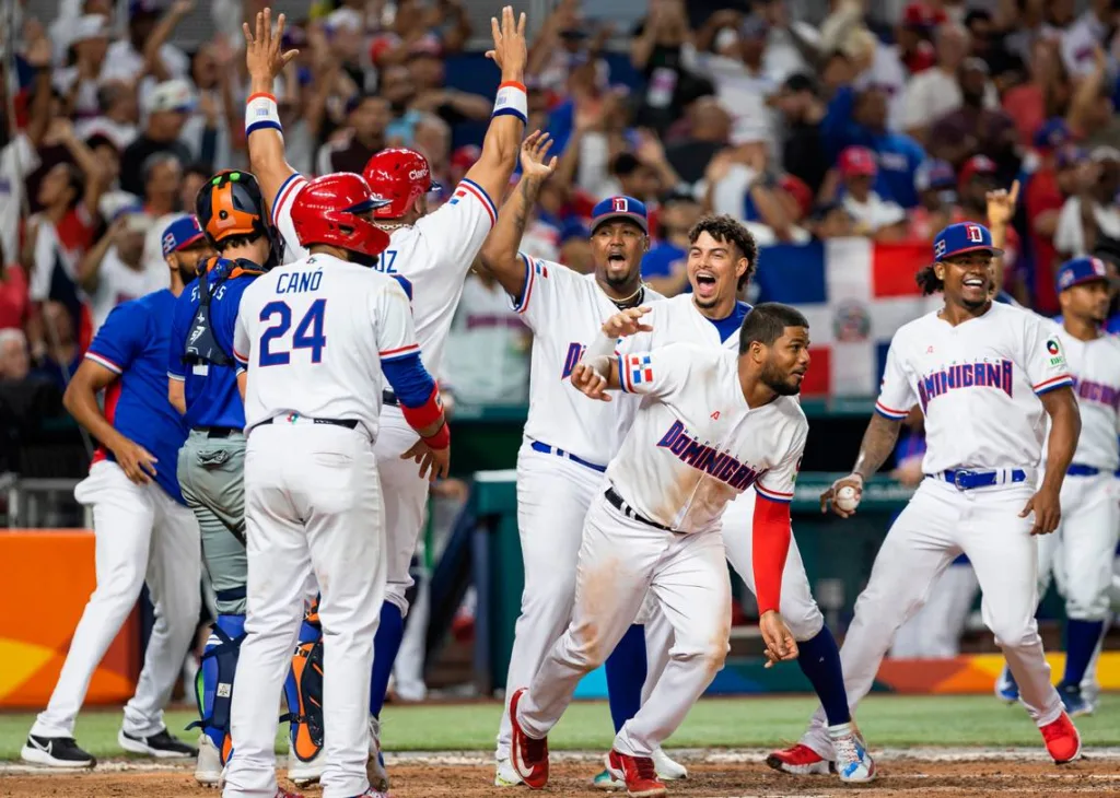 The Dominican Republic celebrating after they were able to win their match against Israel with a 10-0 knockout