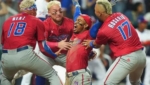 The Puerto Ricans player celebrating after their running home run that set the game 5-1 between them and the Dominican Republic