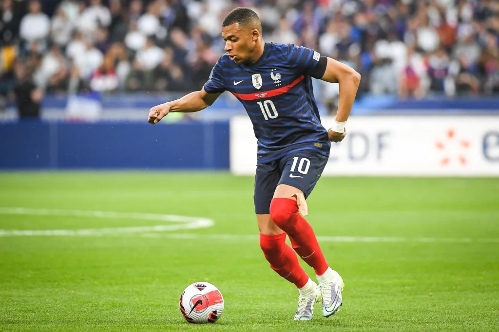 Kylian Mbappe playing with in a French National Team game 