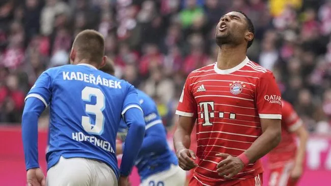 Bayer Munich player seeing their hopes of the Bundesliga title fly away