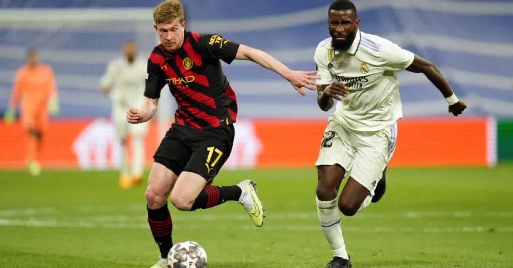 Kevin De Bryune and Antonio Rudiger fighting for the ball in Manchester City and Real Madrid match in the Champions League Semifinal first leg