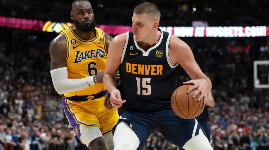 Nikola Jokic with the ball while Lebron James defended him in the game 4 of the Wester Conference Final 2023