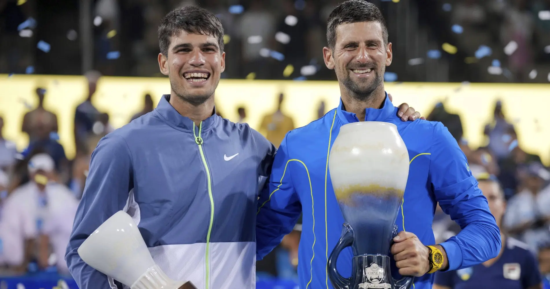 Novak Djokovic and Carlos Alcaraz in the Cincinnati Masters podium after Djokovic defeated Alcaraz in the third set