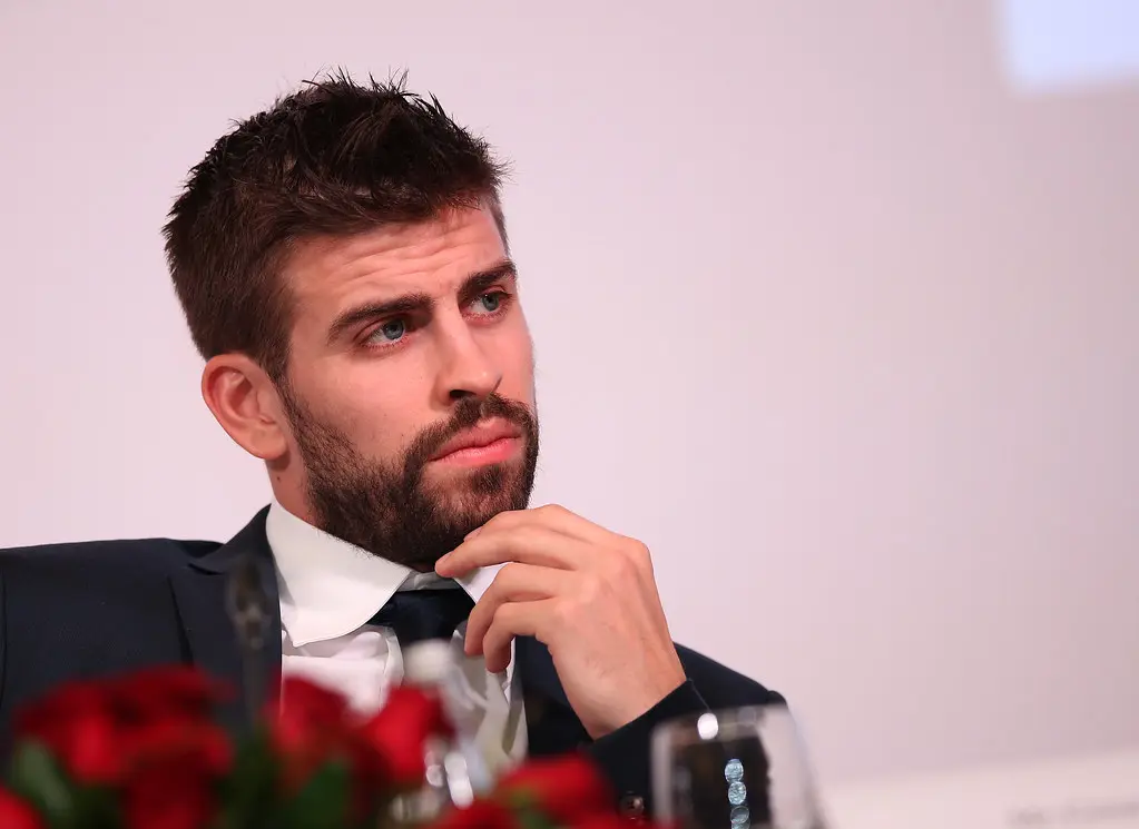Gerarg Piqué in a formal dressing thinking about his future