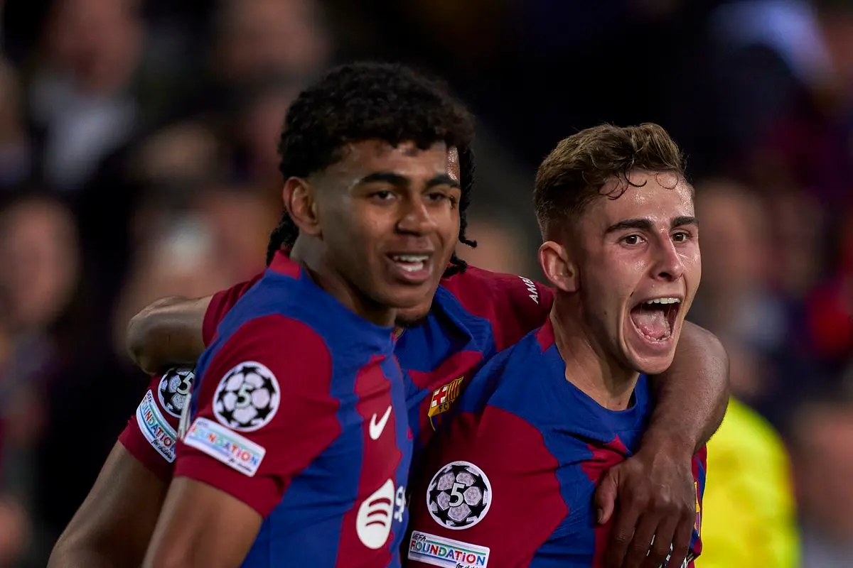 Lamine Yamal and Fermin Lopez celebrating Fermin's goal in their Champions LEague match between Barcelona and Napoli