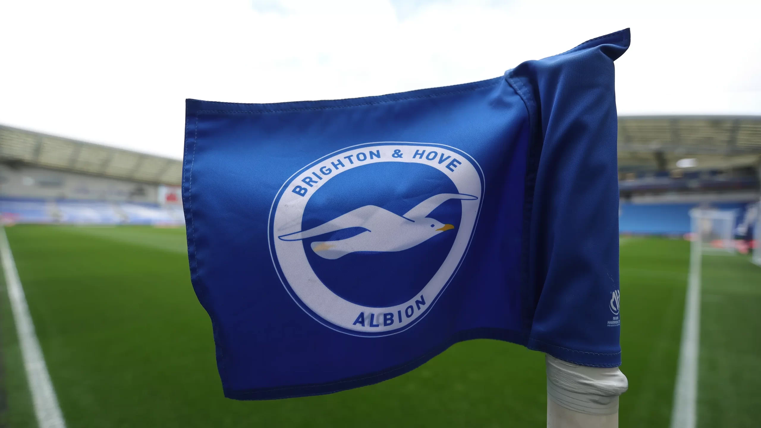 Brighton and Hove Albion FC logo in a stadium of an Europa League match