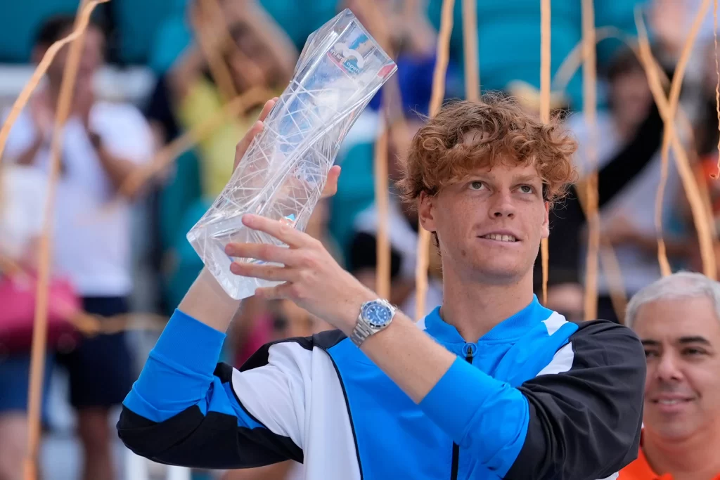 Jannik Sinner lifting the 2024 Miami Open trophy after winning it for the first time against the underdog Grigor Dimitrov 