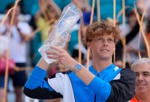 Jannik Sinner lifting the 2024 Miami Open trophy after winning it for the first time against the underdog Grigor Dimitrov