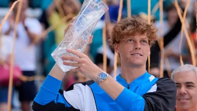 Jannik Sinner lifting the 2024 Miami Open trophy after winning it for the first time against the underdog Grigor Dimitrov