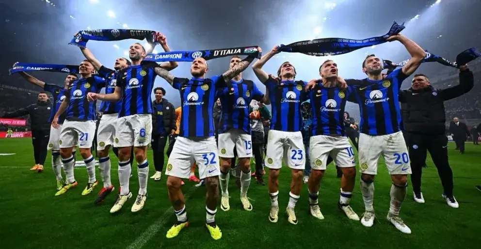 Inter Milan players celebrating their 2023-24 league title after winning the Milan derby against AC Milan