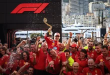 Charles Leclerc celebrating with the entire Ferrari F1 team his victory at Monaco 2024