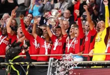 Manchester United players celebrating they 2024 FA Cup final victory against Manchester City