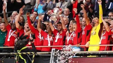 Manchester United players celebrating they 2024 FA Cup final victory against Manchester City